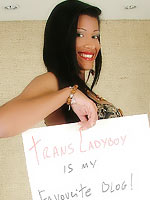 Shemale Miriany Ribeiro holding a fan sign where she confesses she likes our blog