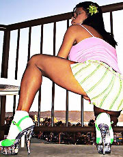 Nikki posing on a balcony