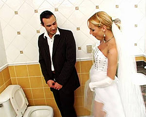 Shemale in a restroom with her husband just after wedding